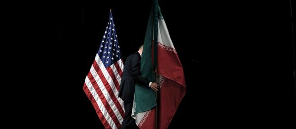 Banderas de EEUU e Irán - Sputnik Mundo