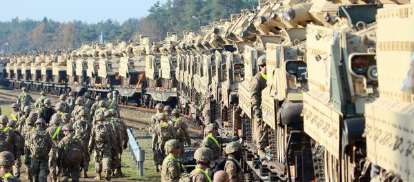 Militares estadounidenses y los tanques Abrams en Lituania (2019) - Sputnik Mundo