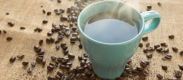 Una taza de café - Sputnik Mundo