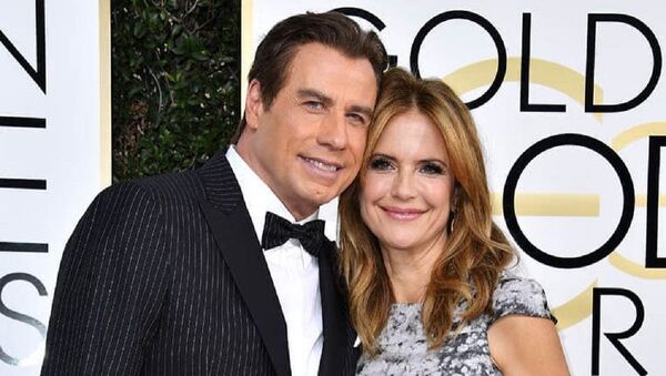 John Travolta junto a Kelly Preston - Sputnik Mundo