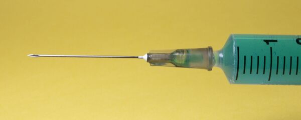 Una inyección - Sputnik Mundo