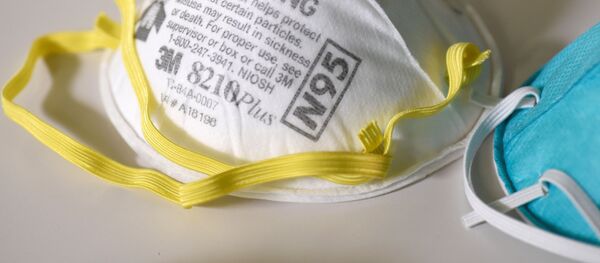 Una mascarilla - Sputnik Mundo