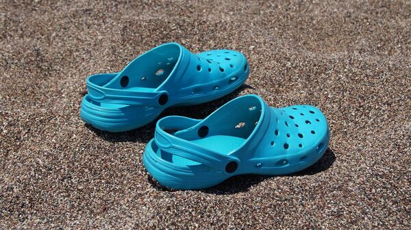 Crocs (imagen referencial) - Sputnik Mundo