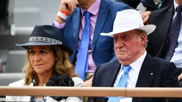 Rey Juan Carlos I con su hija Elena de Borbón y Grecia