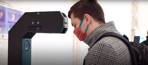 Un terminal  Thermocontrol de Promobot - Sputnik Mundo