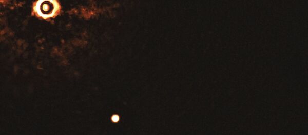 Capturan primera imagen directa de un sistema con dos exoplanetas orbitando una misma estrella - Sputnik Mundo