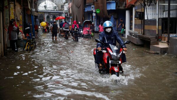 Lluvias en Nueva Delhi, La India - Sputnik Mundo