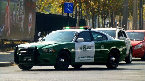 Un coche de Carabineros de Chile - Sputnik Mundo