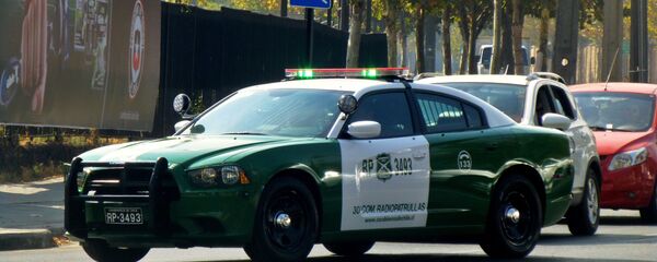 Un coche de Carabineros de Chile - Sputnik Mundo