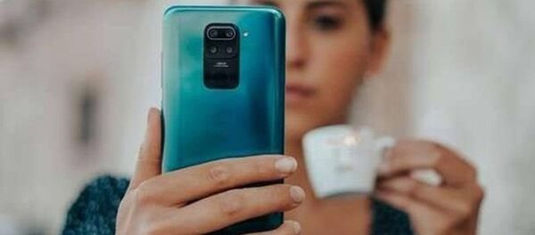 Un Xiaomi Redmi (imagen referencial) - Sputnik Mundo