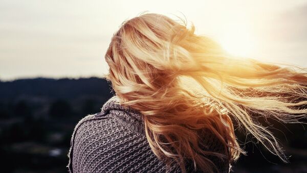 El cabello de una mujer - Sputnik Mundo