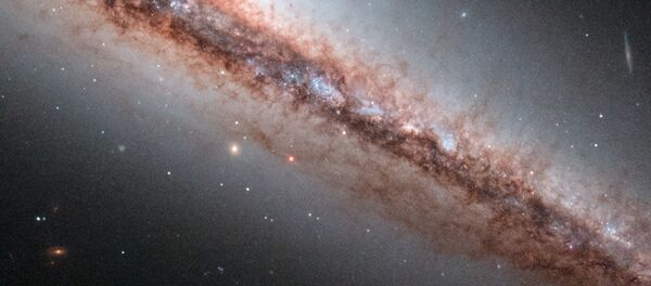 Galaxia NGC 4217 - Sputnik Mundo