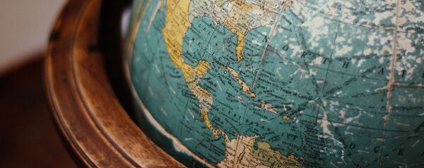 Un globo terráqueo - Sputnik Mundo