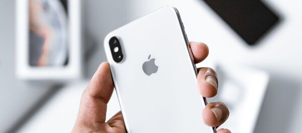 Un iPhone - Sputnik Mundo