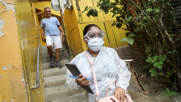 Una médica en mascarilla en Venezuela - Sputnik Mundo