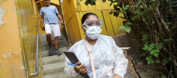 Una médica en mascarilla en Venezuela - Sputnik Mundo