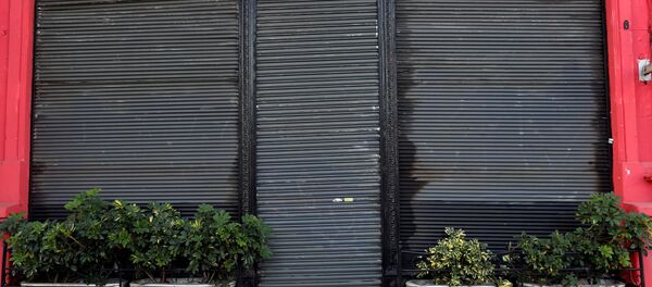 Una tienda cerrada en Buenos Aires, Argentina - Sputnik Mundo