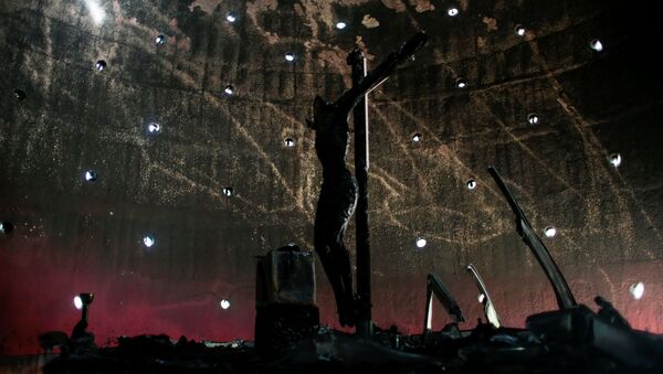 La imagen de la Sangre de Cristo después del incendio - Sputnik Mundo