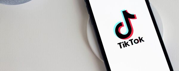 El logo de la aplicación TikTok  - Sputnik Mundo