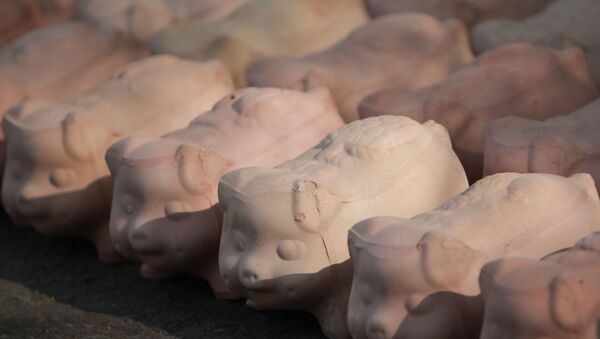Cerdos de arcilla (imagen referencial) Cerdos de arcilla (imagen referencial) - Sputnik Mundo