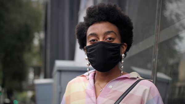 Una mujer jovén en el Centro Histórico de la Ciudad de México - Sputnik Mundo