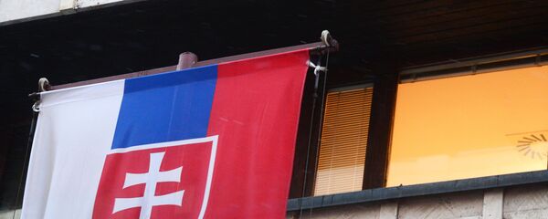 La bandera de Eslovaquia en su Embajada en Moscú La bandera de Eslovaquia en su Embajada en Moscú - Sputnik Mundo