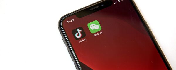 Logos de TikTok y WeChat Logos de TikTok y WeChat - Sputnik Mundo