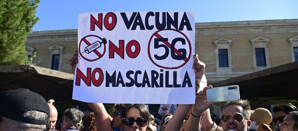 Manifestación de negacionistas del coronavirus en Madrid - Sputnik Mundo
