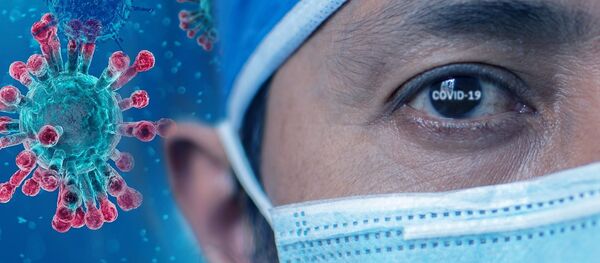 Médico con mascarilla - Sputnik Mundo