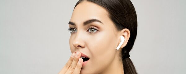 Auriculares inalámbricos, imagen ilustrativa - Sputnik Mundo