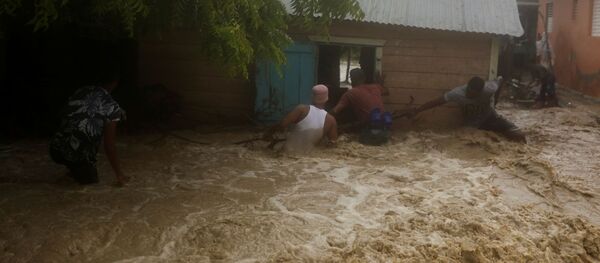 Consecuencias de la tormenta tropical Laura (archivo) Consecuencias de la tormenta tropical Laura (archivo) - Sputnik Mundo