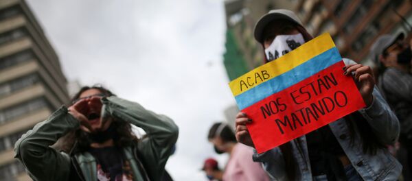 Una protesta contra incremento de la violencia en Colombia - Sputnik Mundo