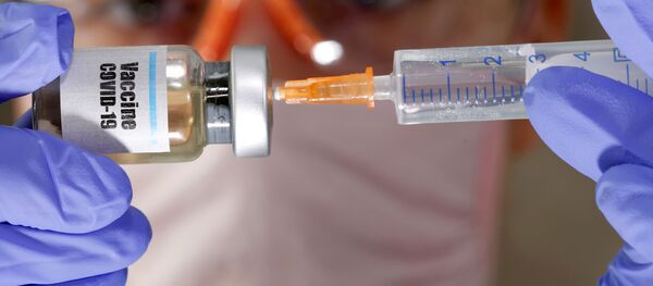 Vacuna contra el COVID-19  - Sputnik Mundo