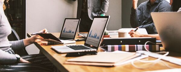 Una oficina en una empresa. Imagen referencial - Sputnik Mundo