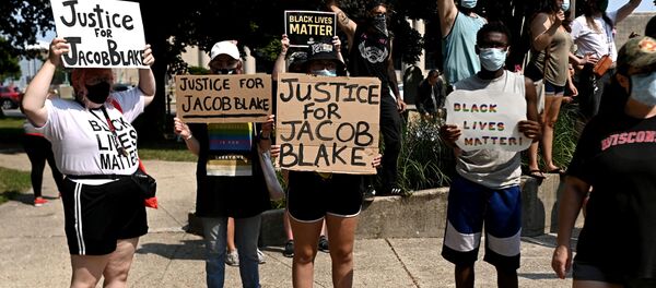 Las protestas contra la brutalidad policial y la discriminación racial en Wisconsin, EEUU - Sputnik Mundo