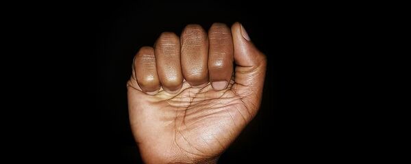 Puño - Sputnik Mundo