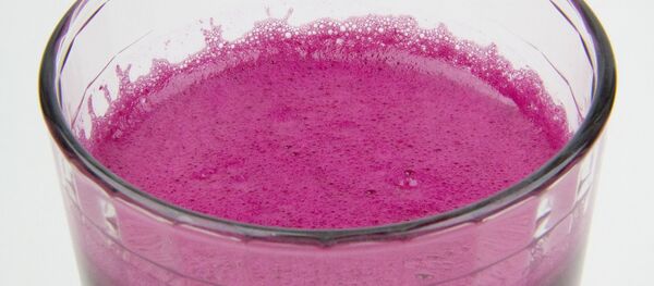 Una bebida de color violeta. Imagen referencial - Sputnik Mundo
