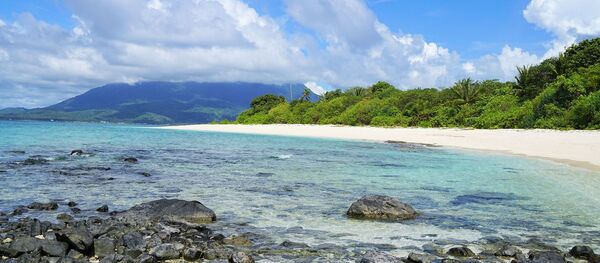 Una playa. Isla desierta. Imagen referencial - Sputnik Mundo