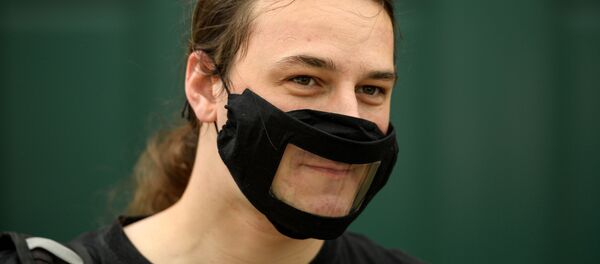 Foto referencial de una mascarilla transparente - Sputnik Mundo