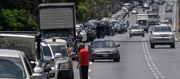 Una fila a la estación de combustible en Caracas, Venezuela (archivo) Una fila a la estación de combustible en Caracas, Venezuela (archivo) - Sputnik Mundo