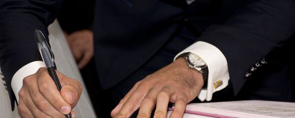 La firma de un acuerdo (imagen referencial) - Sputnik Mundo