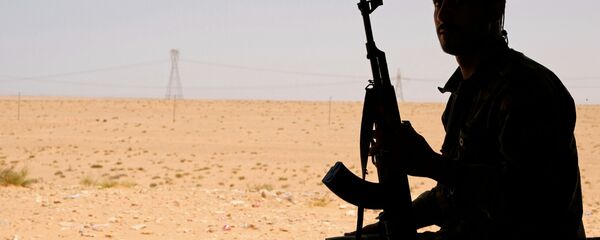 Un miembro del Ejército de Hatar en Libia - Sputnik Mundo