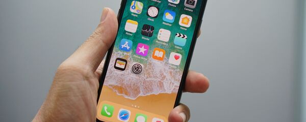 Un Iphone (imagen referencial) - Sputnik Mundo