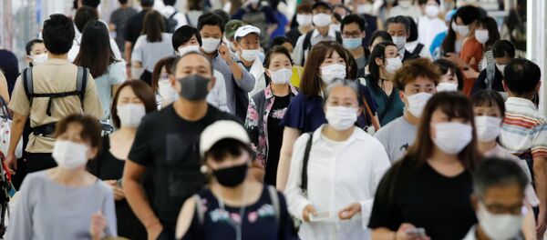 La gente con mascarillas (imagen referencial) - Sputnik Mundo