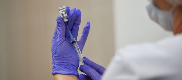 Vacunación contra el COVID-19 - Sputnik Mundo