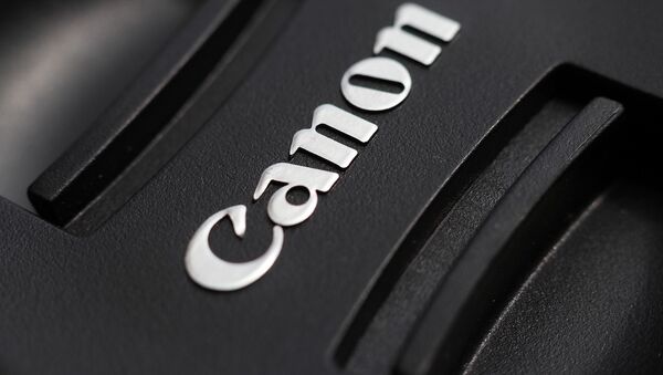 El logo de Canon - Sputnik Mundo