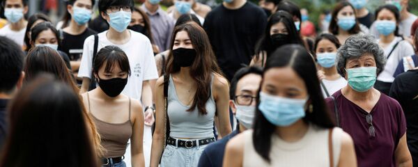Viandantes en Singapur - Sputnik Mundo