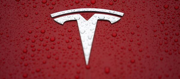 El logo de Tesla - Sputnik Mundo