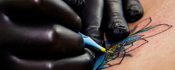 Un tatuaje - Sputnik Mundo