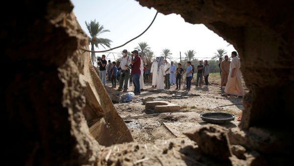 Consecuencias del ataque con cohetes en Irak Consecuencias del ataque con cohetes en Irak - Sputnik Mundo